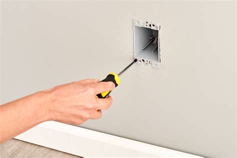 how to cut drywall for electrical box|installing outlet box in drywall.